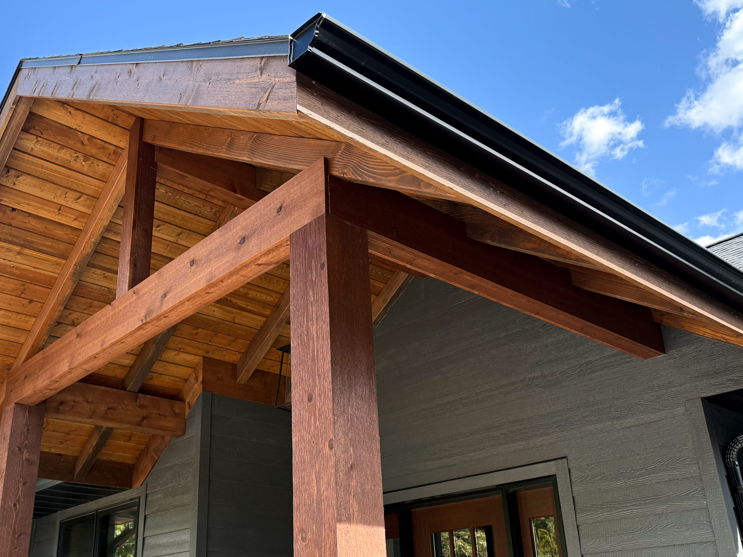Exterior view of a single story home with three car garage