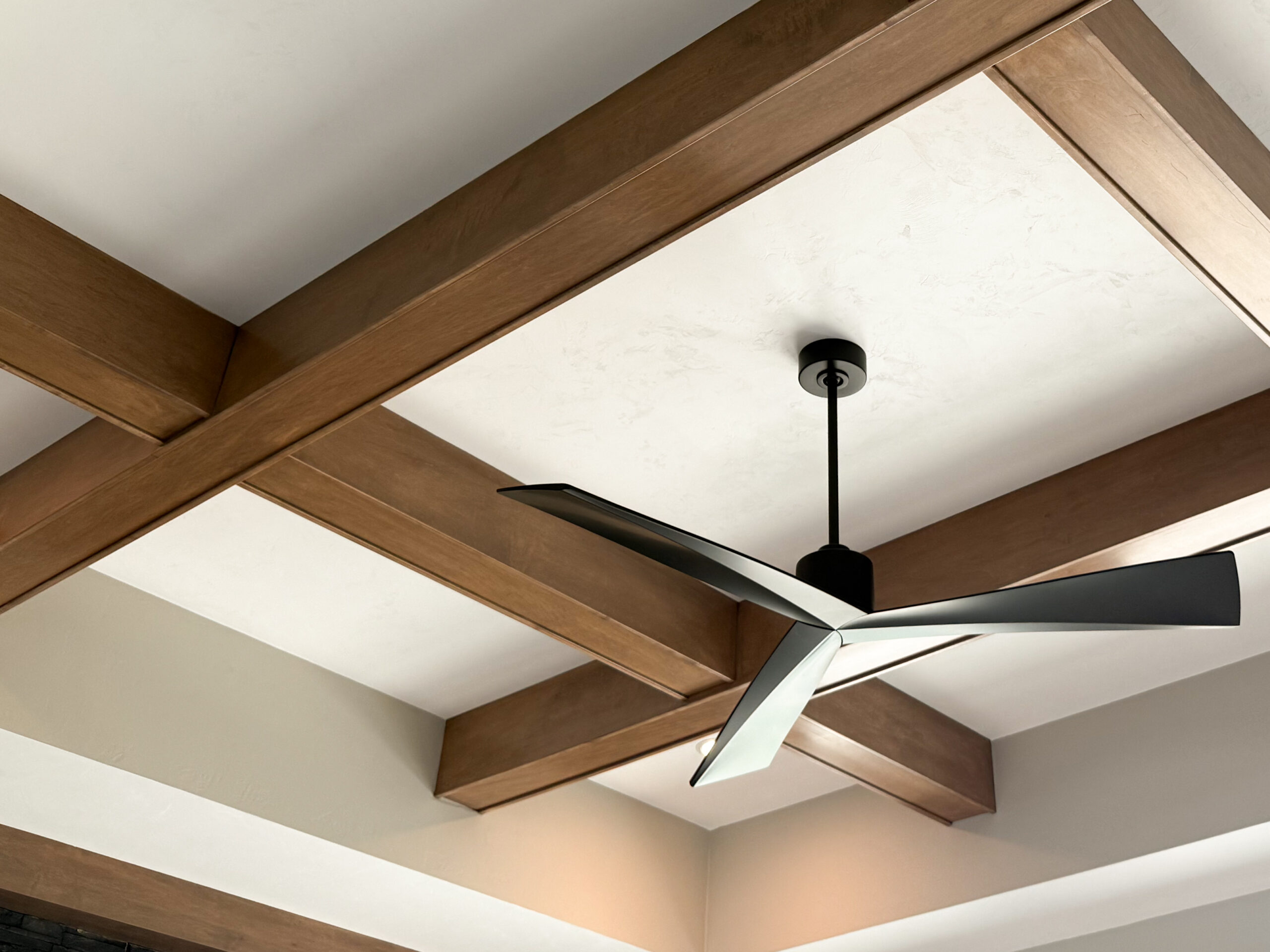 Exterior view of a single story home with three car garage