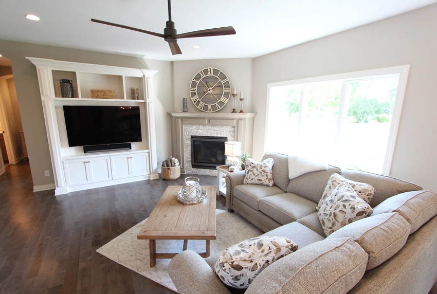 living room with big window and wood floors